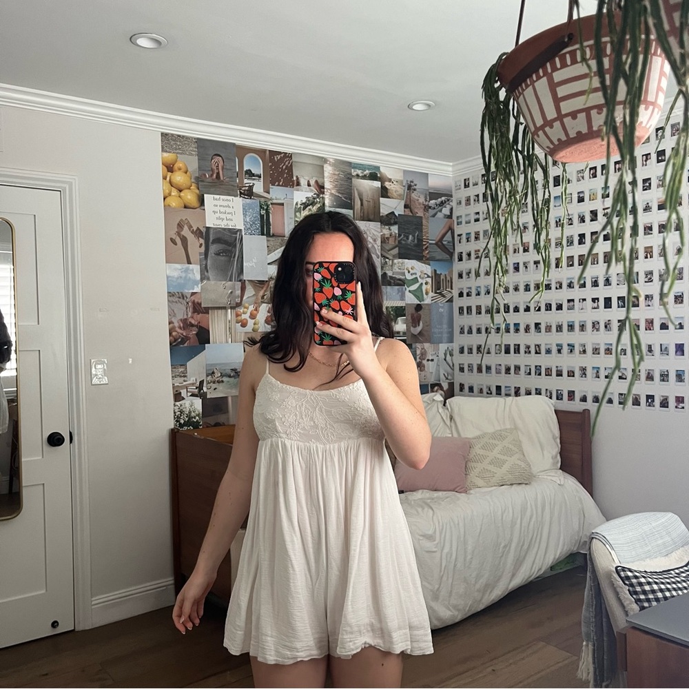 White Romper with Floral Detail